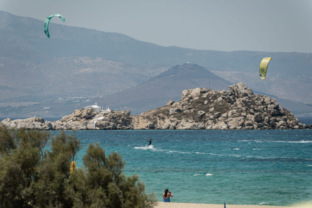 Kitesurfers over the bay at Mikri Vigla, Naxos